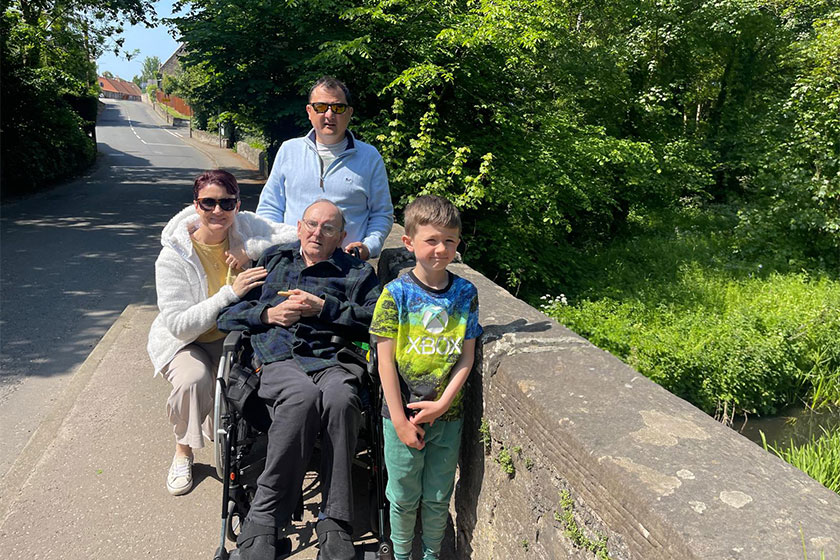 Dennis, a resident at our Tyneholm Stables care home in East Lothian with his family on a day trip 