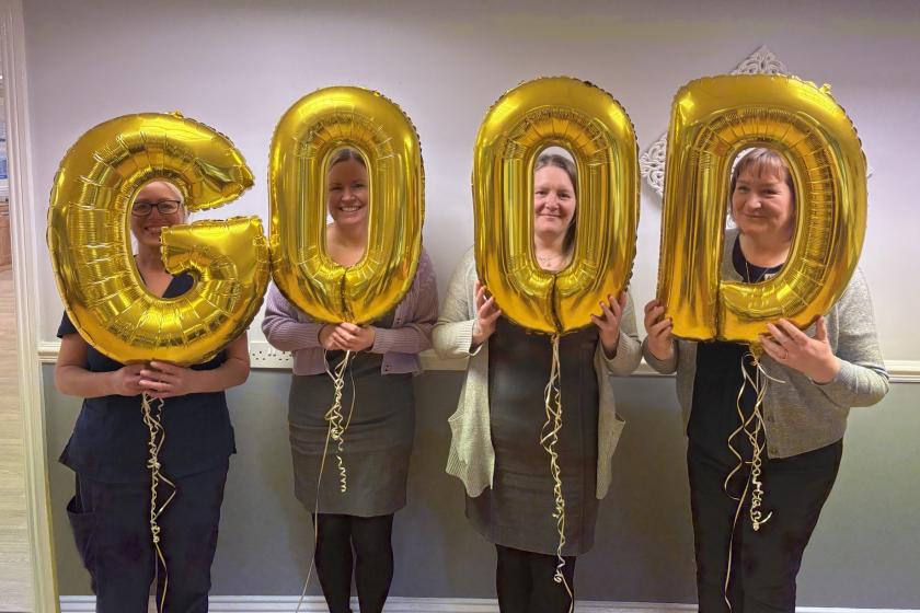 Celebratory Image with Gold CQC Balloons