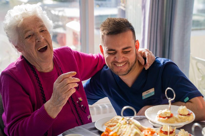 Resident and staff Smiling