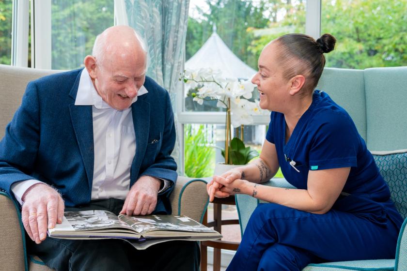 Staff and Resident Smiling