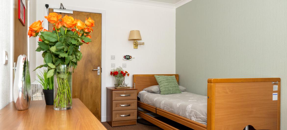 Single bed bedroom at Mull Hall Care Home, Invergordon.