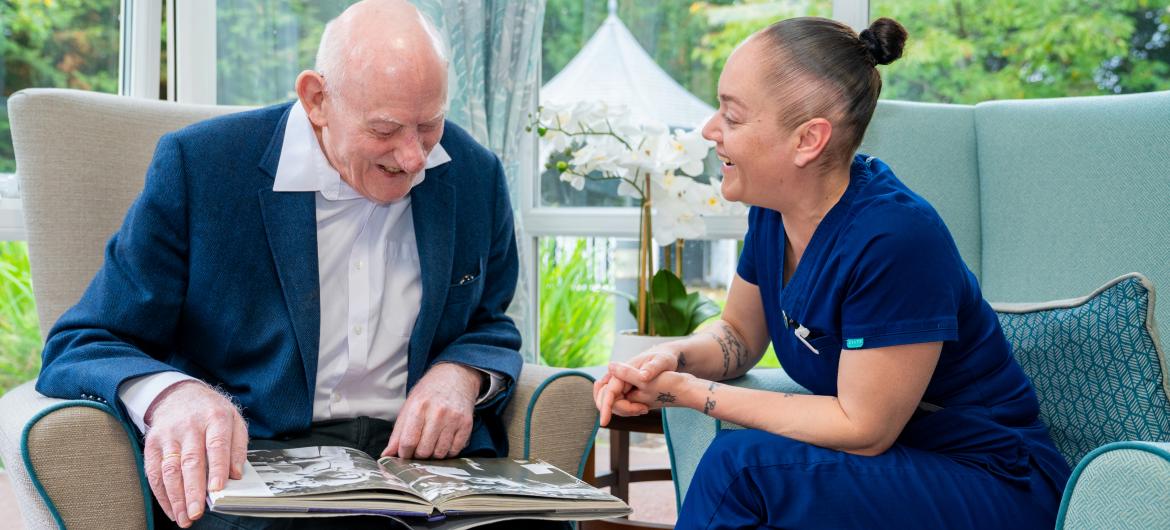 Staff and Resident Smiling