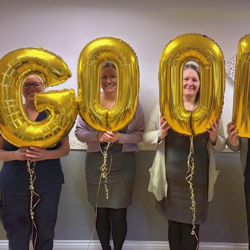 Celebratory Image with Gold CQC Balloons