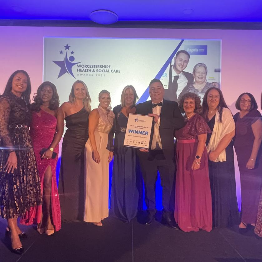 The team from Regent smile for the camera with their award