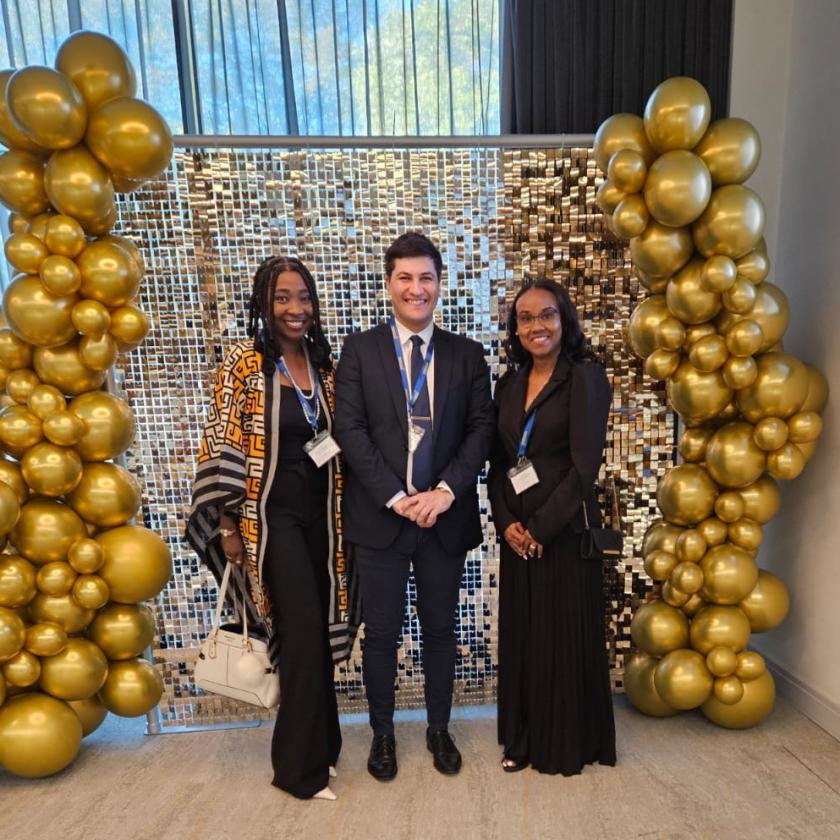 Registered nurse Ayomide, home manager David and nurse manager Okeba smile for the camera on receiving their award