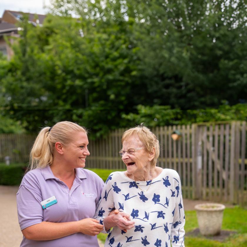 Staff and Resident Smiling