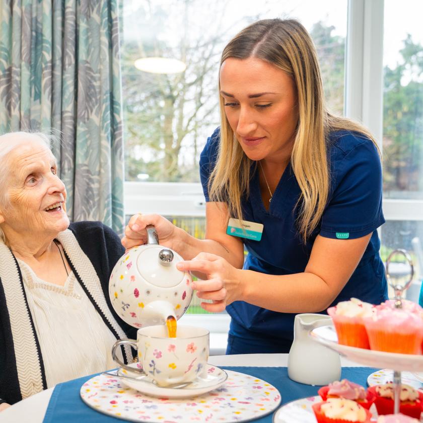 Resident and staff Smiling